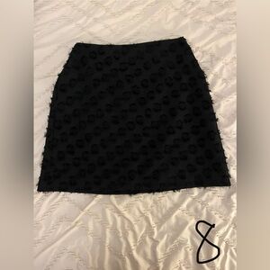 Two short skirts and a maxi skirt